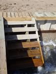 Vinyl Bulkhead with 2x6x16 piano key top cap. - Port Alto Texas - Replacement on old wooden Bulkhead. Used existing piling and new top whaler and tiebacks.