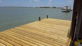 Pier with lower landing with covered platform and L-Head