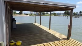 Pier with lower landing with covered platform and L-Head