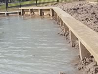 Wooden Bulkhead on private pond