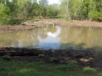 Pier built on private pond with 3 in. PVC pipe for post 8' x 12'