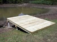 Pier built on private pond with 3 in. PVC pipe for post 8' x 12'