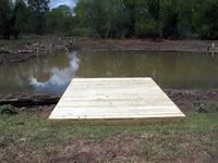 Pier built on private pond with 3 in. PVC pipe for post 8' x 12'