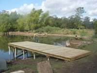 Pier built on private pond with 3in. PVC pipe for post 8' x 26'