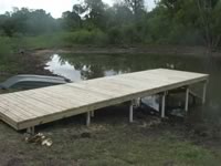 Pier built on private pond with 3in. PVC pipe for post 8' x 26'