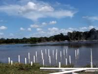 Pier built on private pond with 3 in. PVC pipe for post