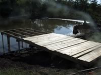 Pier built on private pond with 3in. PVC pipe for post 8' x 26'